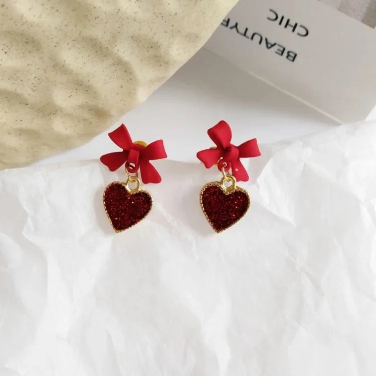Non-waterprood heart shape bow knot alloy stoving varnish women's drop earrings