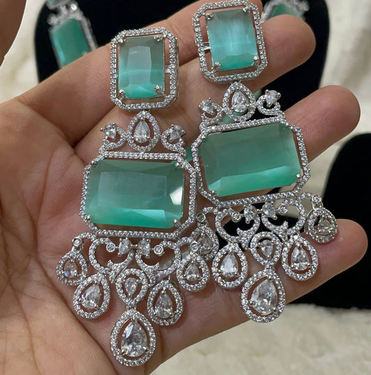 Emerald green american diamond necklace set with silver toned accent
