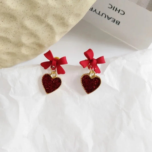 Non-waterprood heart shape bow knot alloy stoving varnish women's drop earrings