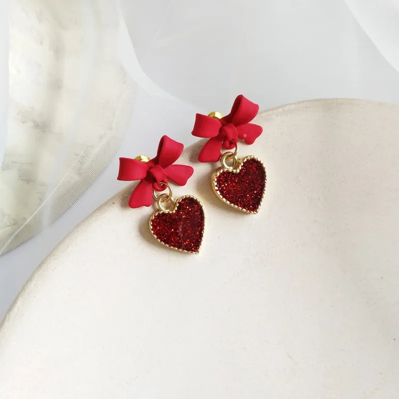 Non-waterprood heart shape bow knot alloy stoving varnish women's drop earrings