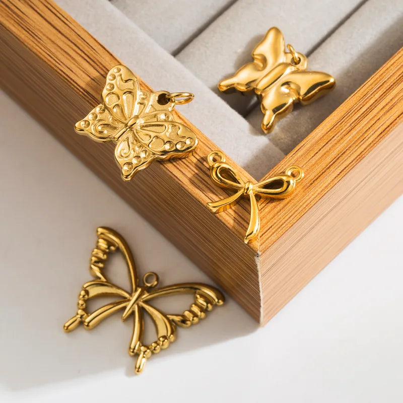 9 *  3mm 25 * 20mm Diameter  5mm Hole  ~ .9mm  4K Gold Plated Butterfly Bow Knot Polished Pendant